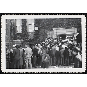 Boys' Club members entering a building during an event