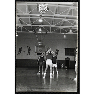 A player shoots a free throw during a basketball game