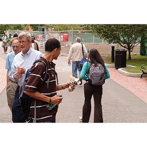 Torch Scholar Odalis David Polanco walks through campus