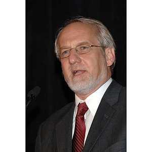 Unknown speaker talks at the Alumni Ball