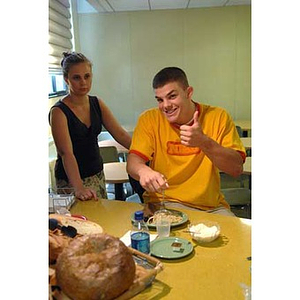 Joseph Bordieri gives a thumbs-up at the Torch Scholars visit to the Exhibition Kitchen