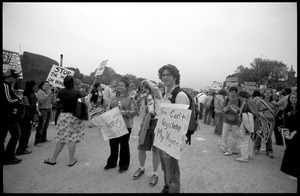 Marchers on the National Mall for the 2004 March for Women's Lives, one with a sign reading 'You can't legislate my vagina'