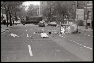 May Day concert and demonstrations: trash bin in road set on fire