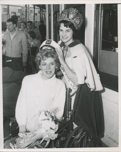 Peggy Colucci receives captain's hat from Georgette Lesch