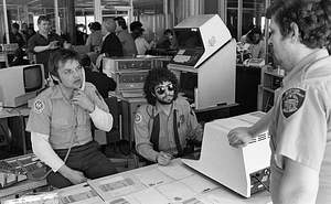 Emergency Medical Technicians Kevin Kelley, Mark Neebe, and Robert Gay in Boston Police Dispatch Operations Center