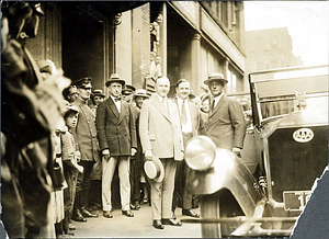 President Calvin Coolidge in front of entrance to security trust building, Willow Street, Lynn, August, 1925
