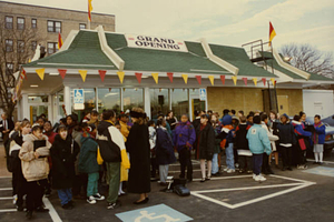 Crowd out front at the opening ceremonies at the Mason Square McDonalds