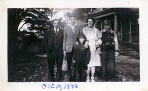 Balcom family in front of home on Winnemay Street, Natick, MA