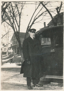 Arthur J. Gaudet, chauffeur for Mr. William Biddle, Biddle and Smart auto body manufacturer, in front of house