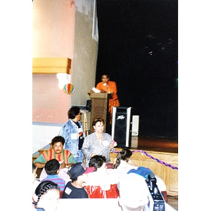 Young man addressing the audience during an event organized by Inquilinos Boricuas en Acción's Teen and Kid Empowerment Program.