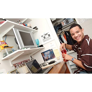 Torch Scholar Odalis David Polanco in his dorm room in Stetson West