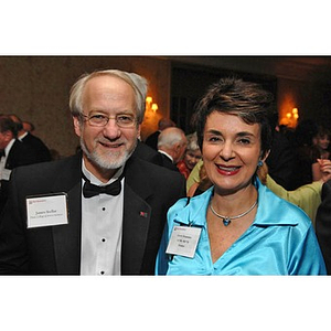 James Stellar, right, and a guest attending a dinner honoring members of the Huntington Society