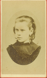 Head-and-shoulders portrait of a girl, looking left, location unknown, undated