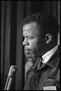 John Lewis interviewed by a reporter at the Youth, Non-Violence, and Social Change conference, Howard University