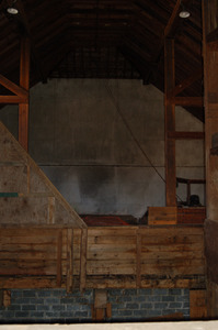 Post and beam structure inside the Cow Barn