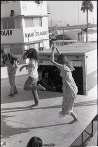 Hollywood Speedway Rock Festival: energetic dancing at end of stage during rock concert