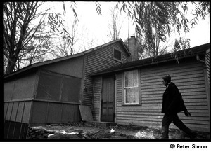 Raymond Mungo walking past the house, Packer Corners Commune