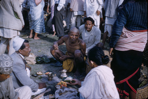 Priest speaking to a worshipper in Gokarna