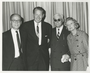 Jeremiah Milbank Jr. and three unidentified persons at the presentation of the second annual George G. Deaver award