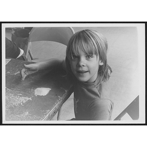 Child sitting at table at Hyde Park branch