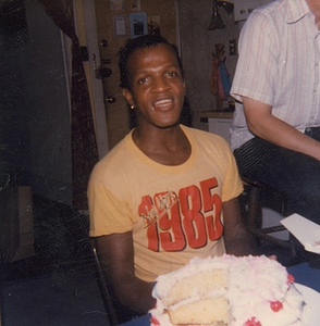A Photograph of Marsha P. Johnson in a Yellow T-Shirt