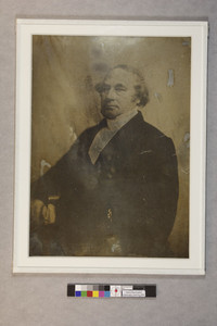 Unidentified man with curly hair