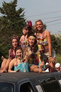 Parade marchers, dressed in beads and bright colors : Provincetown Carnival parade