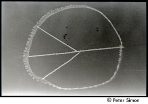 Skywriting (in process) depicting a peace symbol