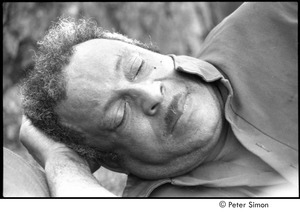 Ram Dass retreat at David McClelland's: Karmu (Edgar Warner) lying under a tree, leaning on his arm