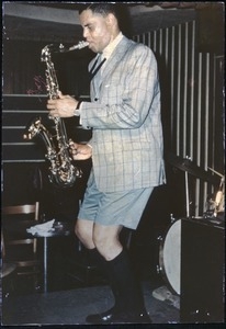 Dexter Gordon: performing at Boston jazz club in checked jacket, shorts, and knee socks
