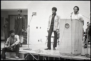 Huey P. Newton speaking at Boston College: Newton at the podium