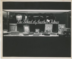 Display case reading 'The School of Another Chance'