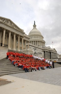 Visiting group, posed on the steps of the United States Capitol building