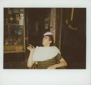 A Photograph of Billie Loba Smoking