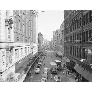 Summer Street from Gilchrist's, Filene's, left, Jordan's, right, people, signs, and vehicles, Boston, MA