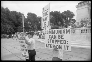 Counter protesters with signs reading 'Communism can be stopped: step on it' and 'All the way with LBJ': Assembly of Unrepresented People peace march on Washington