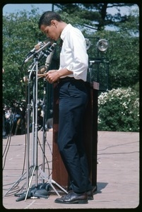 Julian Bond addressing the crowd at an anti-Vietnam War demonstration: full-length shot