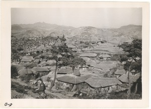 Village at foot of hill