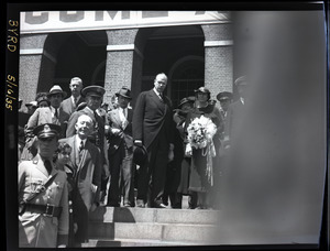 Welcome home ceremony for Richard Byrd at the Massachusetts State House following his Antarctic Expedition: partially obscured shot of Marie Byrd and dignitaries