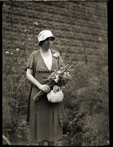Agnes Carr, 'Boston Traveler Poetess,' with bouquet of flowers