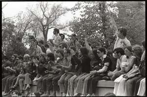 Demonstration at State House against the killings at Kent State: protesters seated on State House steps, applauding