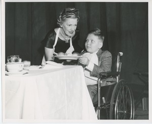 Helen Menken serving Billy Hodne at Thanksgiving