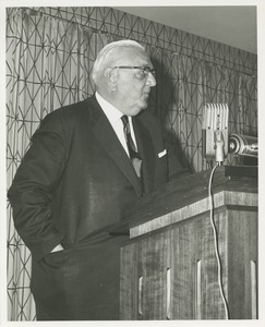 Dr. Frank Krusen speaking at a podium