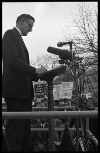 Priest addressing the crowd from the dais during a civil rights demonstration in front of the White House on Lafayette Square