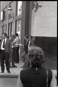 Free Spirit Press crew hawking their magazine to businessmen on the streets