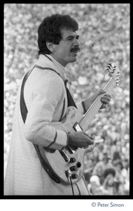 Carlos Santana performing at Bill Graham's SNACK (Students Need Athletics, Culture and Kicks) benefit concert, Kezar Stadium