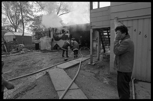 Man in anguish after learning that his garage was gutted by fire, and the family's cat was trapped inside