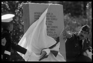 Unveiling the Vietnam War roll of honor at the dedication ceremonies for the Rhode Island Vietnam Veterans Memorial