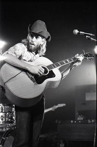 New Riders of the Purple Sage opening for the Grateful Dead at Sargent Gym, Boston University: John 'Marmaduke' Dawson playing acoustic guitar