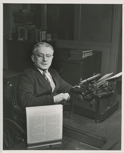 Man using typewriter